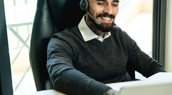 Customer support specialist using a headset